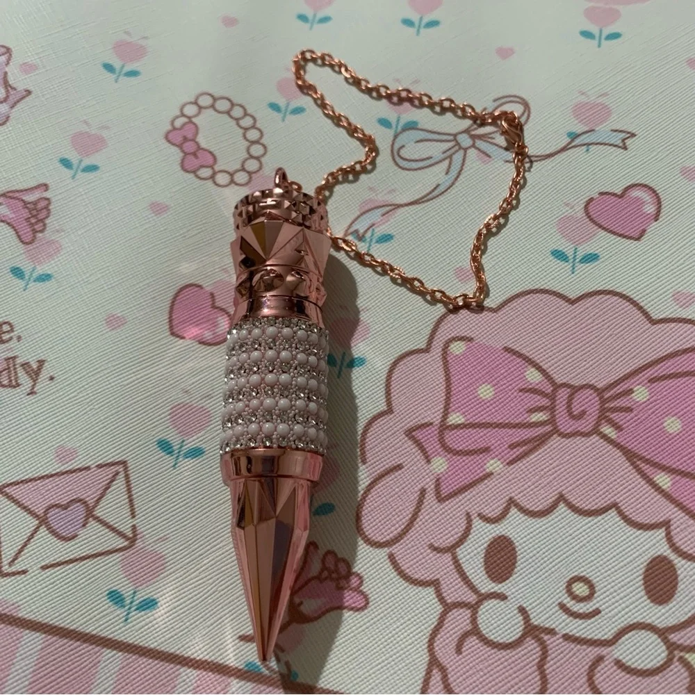 Red Lipstick in a Unique Tube Adorned with Pearls and Crystals